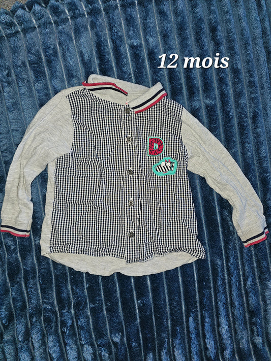 Chemise gris le derrière et blanc